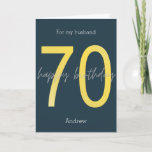 Blue and Gold 70th Birthday Card<br><div class="desc">Personalized navy blue and gold 70th birthday card for husband. The front features of the number 70 in gold with a happy birthday message. You will be able to easily personalize the front with his name, the inside card birthday message and the back with the year. This personalized 70th card...</div>