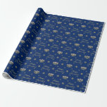 Blue and Golden Happy Hanukkah Wrapping Paper<br><div class="desc">Here we have a lovely wrapping paper that features a beautiful metallic gold menorah, Star of David and snowflakes with the words "Happy Hanukkah" on a dark winter blue colored background. This paper is available in multiple sizes and is a match to other wrapping papers, tissue papers, gift bags and...</div>