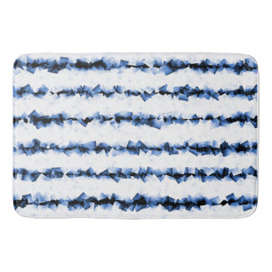 blue and gray crinkly textured lines on white bath mat