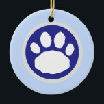 Blue and Gray Paw Print Ceramic Ornament<br><div class="desc">This round keepsake ornament features a large animal paw print in colors inspired by the Hanukkah season. Make it uniquely yours by adding a name or your customized message. See more gift ideas for your favorite four-legged friends and their pet parents at zazzle.com/paws_for_celebration . Pin or bookmark this page to...</div>