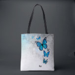 Blue and Silver Watercolor Butterflies Tote Bag<br><div class="desc">Create your own beautiful personalized butterfly tote bags using an elegant DIY template. Easily add your name or a custom quote in elegant calligraphy script on the front, and a monogram letter / initials to the back. The rustic watercolor artwork created by Raphaela Wilson depicts a graceful flying arch of...</div>