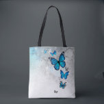 Blue and Silver Watercolor Butterflies Tote Bag<br><div class="desc">Create your own beautiful personalized butterfly tote bags using an elegant DIY template. Easily add your name or a custom quote in elegant calligraphy script on the front, and a monogram letter / initials to the back. The rustic watercolor artwork created by Raphaela Wilson depicts a graceful flying arch of...</div>