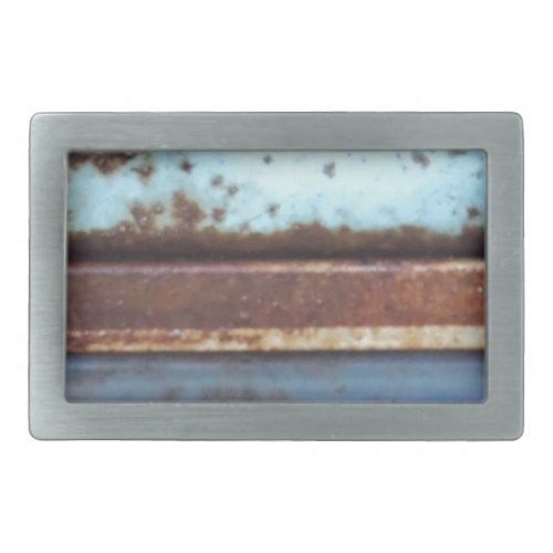 Blue and teal rusty truck close_up belt buckle