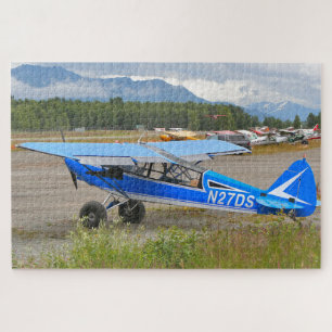 Blue and white aircraft, Lake Hood, Alaska Jigsaw Puzzle