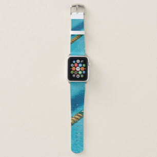 Blue and white beaded necklace on blue body of wat apple watch band