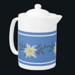 Blue and White Edelweiss Teapot<br><div class="desc">European inspired teapot done with a blue and white stripe,  around the pot and graphics of white edelweiss,  across the middle. Great gift idea.  Matching bone china tea mug available.</div>