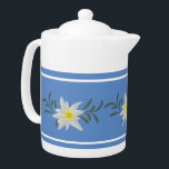 Blue and White Edelweiss Teapot<br><div class="desc">European inspired teapot done with a blue and white stripe,  around the pot and graphics of white edelweiss,  across the middle. Great gift idea.  Matching bone china tea mug available.</div>