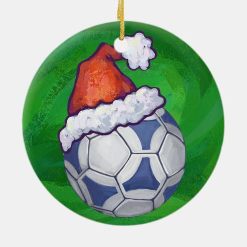 Blue and White Festive Soccer Ball on Green Ceramic Ornament