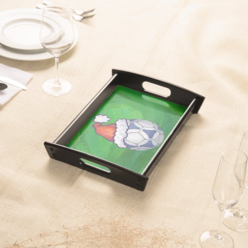 Blue and White Festive Soccer Ball on Green Serving Tray