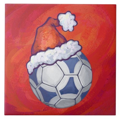 Blue and White Festive Soccer Ball on Red Ceramic Tile