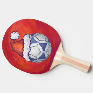 Blue and White Festive Soccer Ball on Red Ping-Pong Paddle