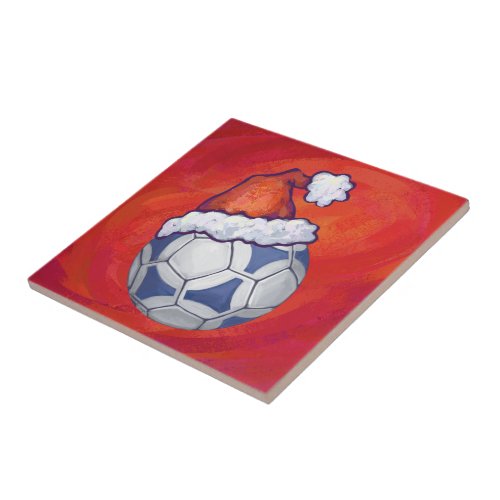 Blue and White Festive Soccer Ball on Red Tile