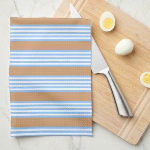 Blue and white five stripes pattern with tan kitchen towel