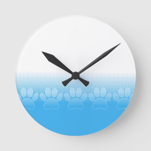 Blue And White Paws With Newsprint Background Round Clock