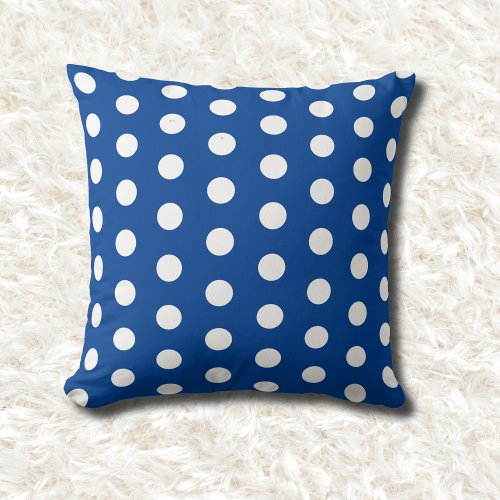 blue and white polka dots throw pillow