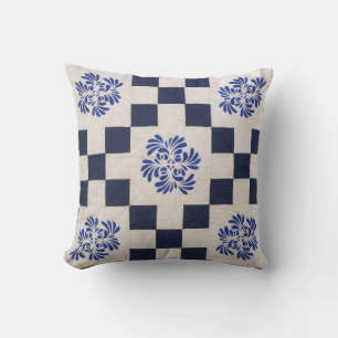Blue and white quilt throw pillow