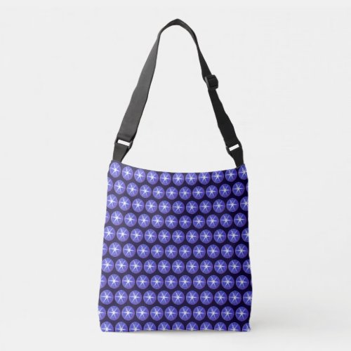 Blue and white star sapphire spheres on navy blue crossbody bag