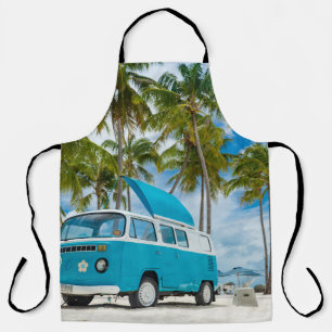 Blue and white van on beach apron