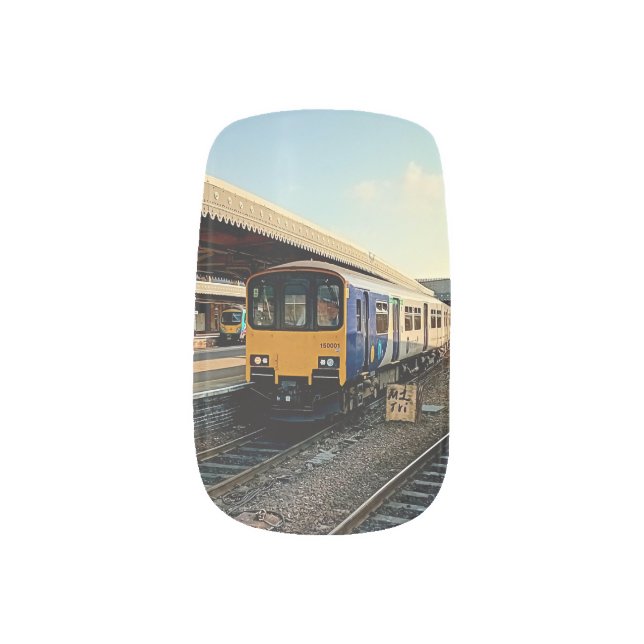 Blue and yellow train minx nail art (Left Thumb)