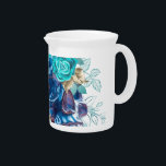 Blue Bloom Requiem Beverage Pitcher<br><div class="desc">Blue Bloom Requiem — a mesmerizing design that beautifully blends dark elegance and floral mystique. This captivating artwork features a haunting skull adorned with delicate blue blooms, symbolizing beauty within darkness and the poetry of contrast. Perfect for those who love gothic charm, floral artistry, and bold statement pieces. Whether you’re...</div>