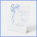 Blue Bow Something Blue Before I Do Mimosa Bar Pedestal Sign<br><div class="desc">A bridal shower should be a celebration filled with meaningful moments, effortless sophistication, and a touch of indulgence. This Mimosa Bar sign sets the perfect tone, inviting guests to craft their own sparkling cocktails with simple, elegant instructions. Featuring a beautifully illustrated blue ribbon and refined typography, this piece complements a...</div>