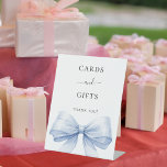 Blue bow white cards gifts sign<br><div class="desc">White elegant background,  decorated with a large blue bow.  Text: Cards and Gifts. Thank you!</div>