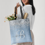 Blue Brushed Metal Silver Glitter Monogram Name Tote Bag<br><div class="desc">Easily personalize this trendy chic tote bag design featuring pretty silver sparkling glitter on a blue brushed metallic background.</div>