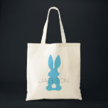 Blue Bunny Silhouette Easter Personalized Tote Bag<br><div class="desc">Blue Bunny Silhouette Easter Personalized Kids Egg Hunt Tote. Blue bunny silhouette with fluffy tails. Personalize with your child's name in the center. Change the color of the text by choosing 'customize'. Cute personalized tote for Easter egg hunts, treats from the Easter bunny or kids who love bunny rabbit designs....</div>