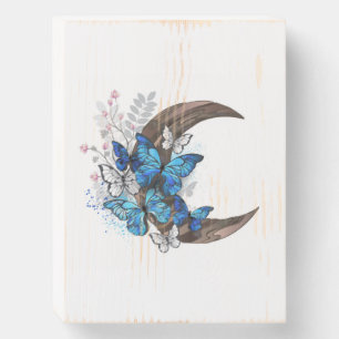 Blue butterflies on wooden crescent box sign