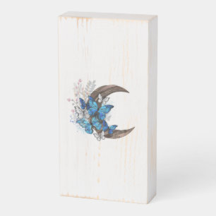 Blue butterflies on wooden crescent box sign