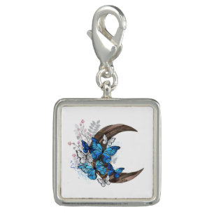 Blue butterflies on wooden crescent charm