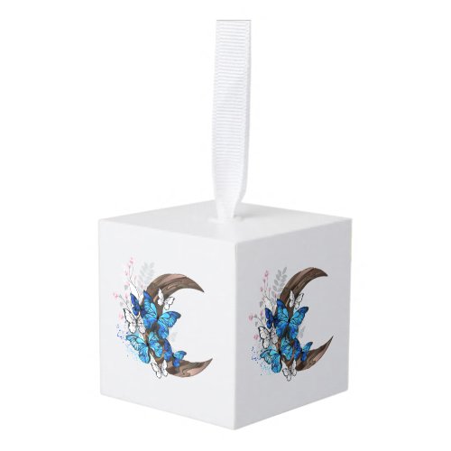 Blue butterflies on wooden crescent cube ornament