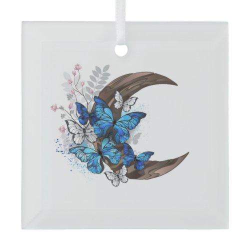 Blue butterflies on wooden crescent glass ornament