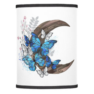 Blue butterflies on wooden crescent lamp shade