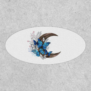 Blue butterflies on wooden crescent patch