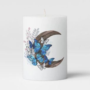 Blue butterflies on wooden crescent pillar candle