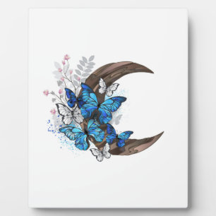 Blue butterflies on wooden crescent plaque