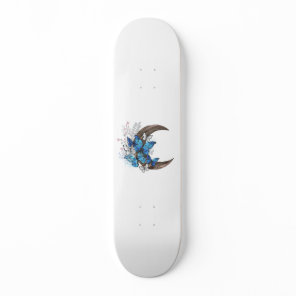 Blue butterflies on wooden crescent skateboard