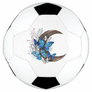 Blue butterflies on wooden crescent soccer ball