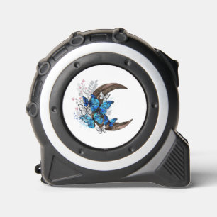 Blue butterflies on wooden crescent tape measure