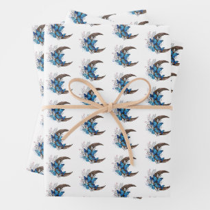 Blue butterflies on wooden crescent wrapping paper sheets