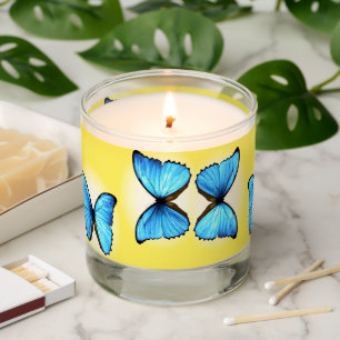 Blue butterflies on yellow scented candle