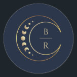 Blue Celestial Wedding Classic Round Sticker<br><div class="desc">Seal your celestial theme with the "Blue Celestial Wedding Classic Round Sticker, " against a chic blue background. The crescent moon and stars, complemented by the stylishly simple customizable initials of the couple, become an enchanting emblem. Moon phases delicately incorporated add a layer of symbolism, making these stickers more than...</div>