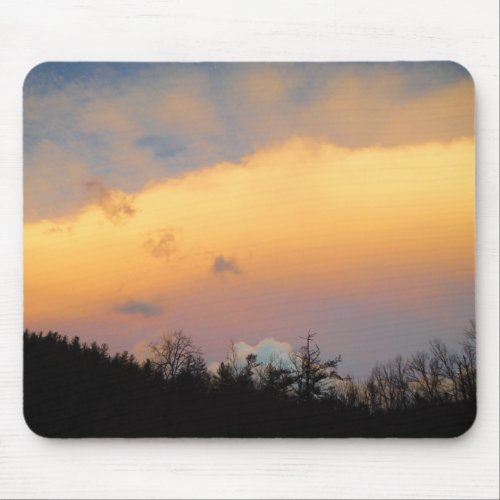 Blue clouds in a lavender sky mouse pad
