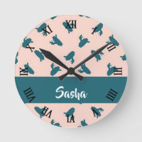 Blue coiled snakes on pink round clock