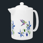 Blue Columbine Garden Hummingbird Teapot<br><div class="desc">A pretty little hummingbird comes to check out the delicate blue Columbine blossoms on this decorative and useful teapot. The watercolor images are placed on a white background. The design appears three times around the circumference of the pot. Be sure to see the matching home products in our store.</div>