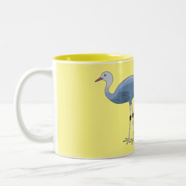 Blue crane bird cartoon illustration  Two-Tone coffee mug (Left)
