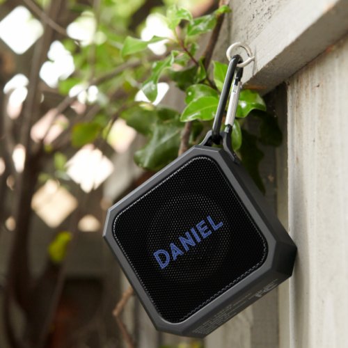 Blue custom name on black bluetooth speaker