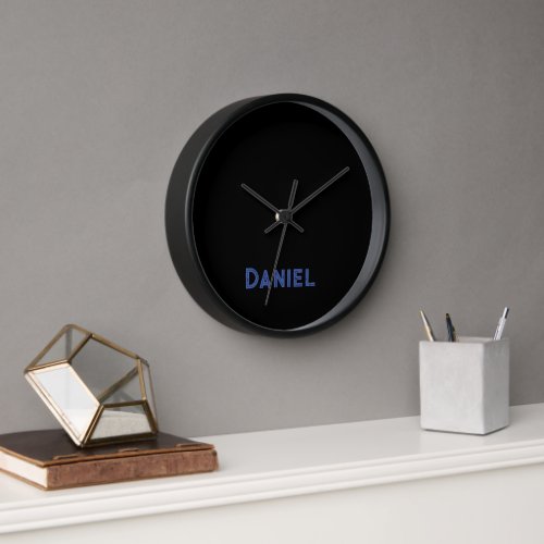 Blue custom name on black clock