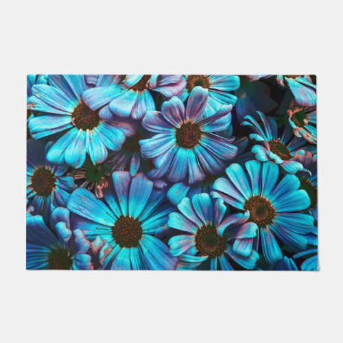 blue daisy in bloom in spring doormat